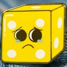 Pin's émaillé jaune - Le Dé Pité